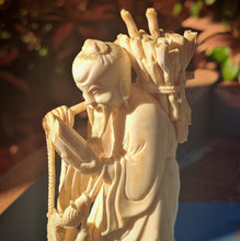 Load image into Gallery viewer, Vintage Asian Fisherman Figurine Resin or Bone Effect Scholar Statue with Fish Carved Figure 19.5cm
