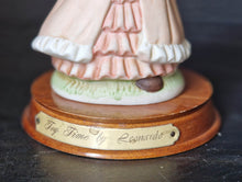 Load image into Gallery viewer, Joy Of time by Leonardo Figurine, Girl with rocking doll ceramic figure with wooden plinth base