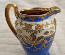 Load image into Gallery viewer, Vintage Hand-Painted Japanese Samurai Creamer Jug – Gold & Blue Enamel Ceramic Milk Jug