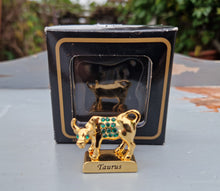 Load image into Gallery viewer, Crystal Temptations 24K Gold-Plated Taurus Zodiac Figurine with Swarovski Components – Elegant Collectible Gift