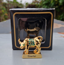 Load image into Gallery viewer, Crystal Temptations 24K Gold-Plated Taurus Zodiac Figurine with Swarovski Components – Elegant Collectible Gift