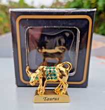 Load image into Gallery viewer, Crystal Temptations 24K Gold-Plated Taurus Zodiac Figurine with Swarovski Components – Elegant Collectible Gift