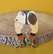 Load image into Gallery viewer, An Enamelled Metal Novelty Corkscrew in the Form of Rugby Player Legs, 9cm high