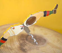 Load image into Gallery viewer, An Enamelled Metal Novelty Corkscrew in the Form of Rugby Player Legs, 9cm high