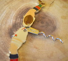Load image into Gallery viewer, An Enamelled Metal Novelty Corkscrew in the Form of Rugby Player Legs, 9cm high