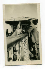 Load image into Gallery viewer, Vintage Black &amp; White Photograph - A smartly dressed man on pier, seagull flying
