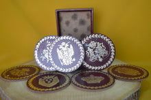 Load image into Gallery viewer, Charming Set of 7 Vintage Round Red &amp; Gold Coasters with Coat of Arms Design

