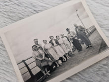 Load image into Gallery viewer, Vintage Black &amp; White Old Family Group Travel Photograph, Group Of Woman with Smartly Dressed Men By
