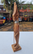Load image into Gallery viewer, Vintage Wood Carved African Tribal Statue Figure Warrior Hunter With Hunting Sticks and Metal Neckla
