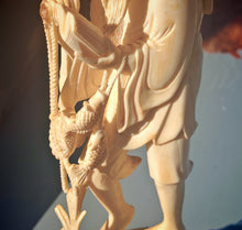 Load image into Gallery viewer, Vintage Asian Fisherman Figurine Resin or Bone Effect Scholar Statue with Fish Carved Figure 19.5cm
