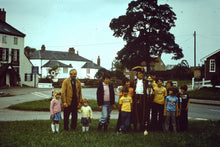 Load image into Gallery viewer, Vintage Slide Negative : A Group of people with a male town crier, outdoor photo
