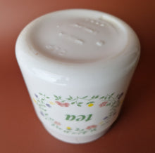 Load image into Gallery viewer, Vintage CLP Milk Glass Tea Canister Storage Jar , Floral Design , 11.5cm tall, 10cm diameter
