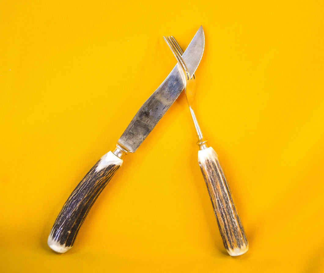 Steak knife and fork set with antler handles, approx age from 1970's, 1 knife, 1 fork