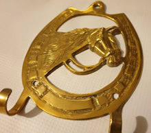 Load image into Gallery viewer, Brass Horseshoe Hanging Key Holder with horse head in the middle

