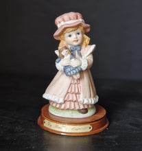 Load image into Gallery viewer, Joy Of time by Leonardo Figurine, Girl with rocking doll ceramic figure with wooden plinth base
