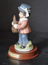 Load image into Gallery viewer, Joy Of time by Leonardo Figurine, Boy with rocking horse toy ceramic figure with wooden plinth base
