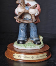 Load image into Gallery viewer, Joy Of time by Leonardo Figurine, Boy with rocking horse toy ceramic figure with wooden plinth base
