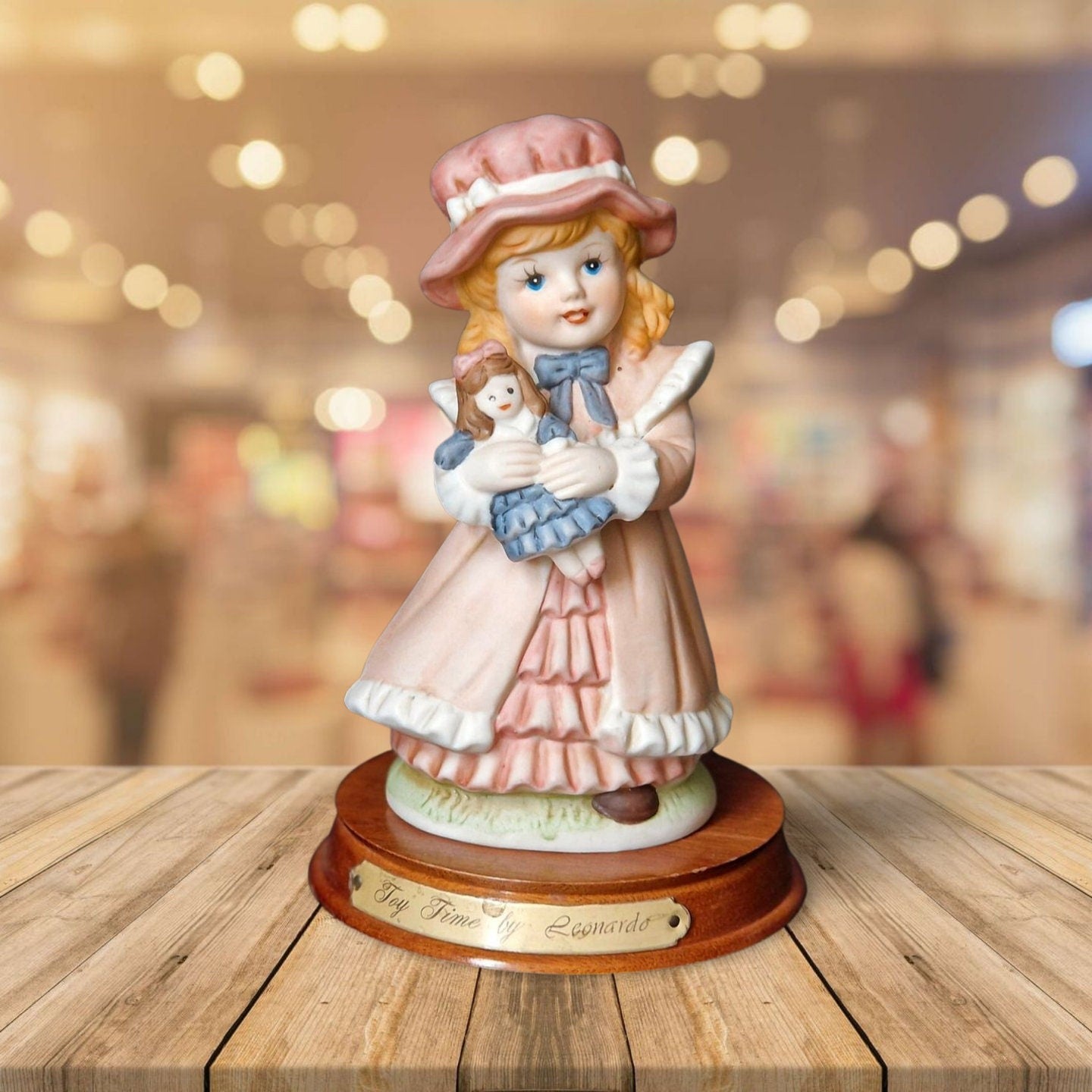 Joy Of time by Leonardo Figurine, Girl with rocking doll ceramic figure with wooden plinth base