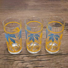 Load image into Gallery viewer, Vintage Mid-Century Palm Tree and Sailboat Glasses Set of 3 1950s
