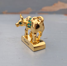 Load image into Gallery viewer, Crystal Temptations 24K Gold-Plated Taurus Zodiac Figurine with Swarovski Components – Elegant Collectible Gift
