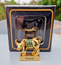 Load image into Gallery viewer, Crystal Temptations 24K Gold-Plated Taurus Zodiac Figurine with Swarovski Components – Elegant Collectible Gift
